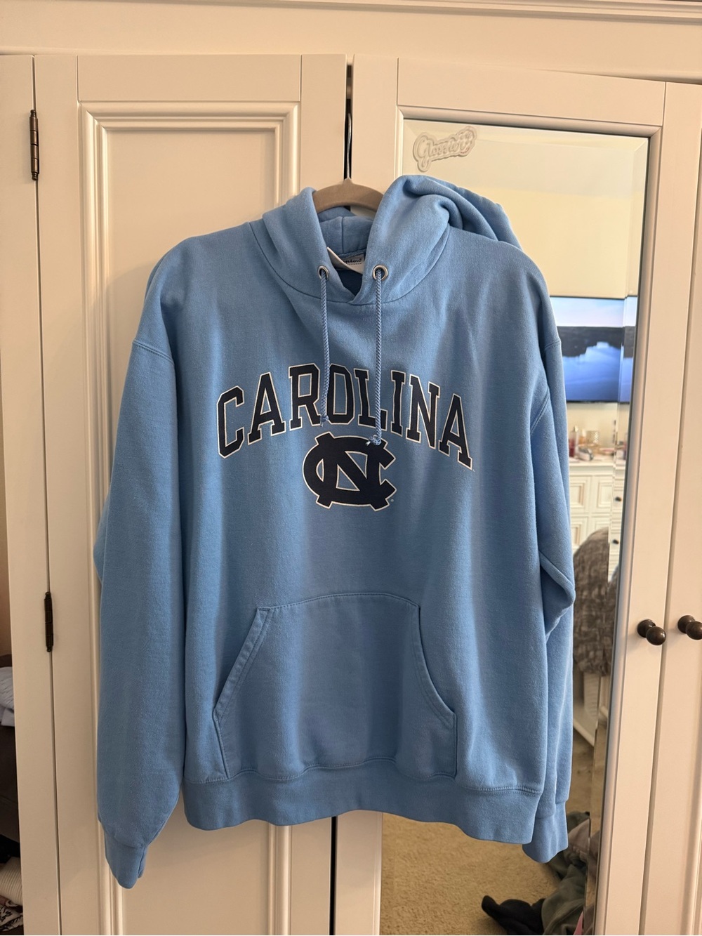 Champion Carolina Light Blue Pullover Hoodie with Arch Logo